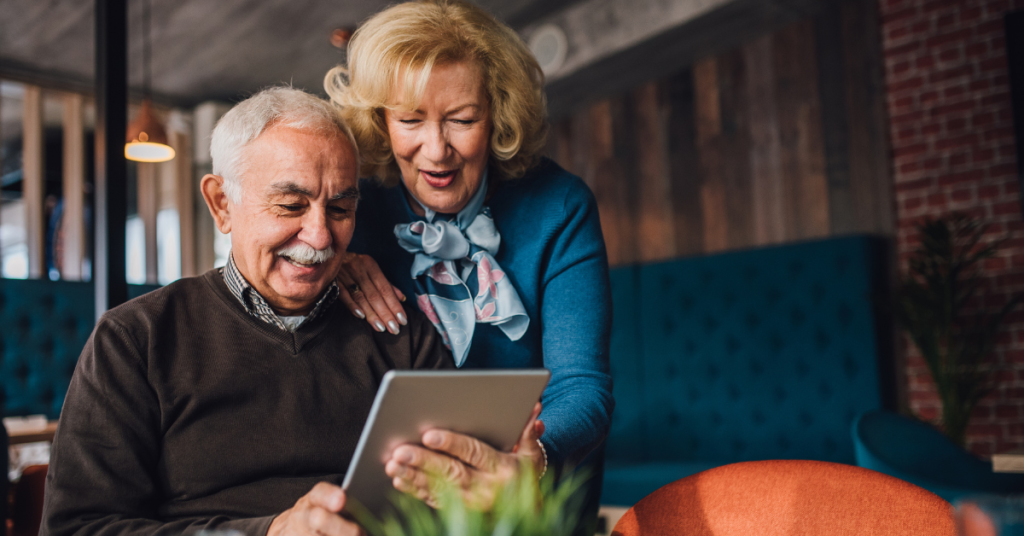 over 60s completing market research on tablet